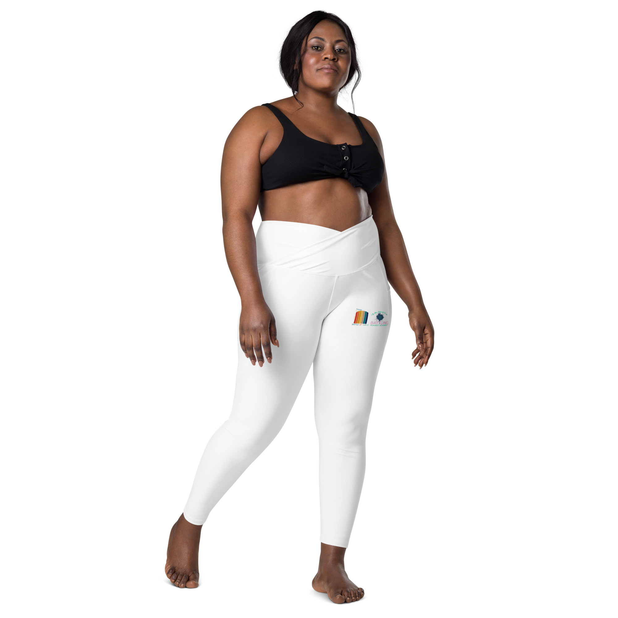 https://donatellonursing.com/wp-content/uploads/2023/07/all-over-print-crossover-leggings-with-pockets-white-front-64a8573147429.jpg
